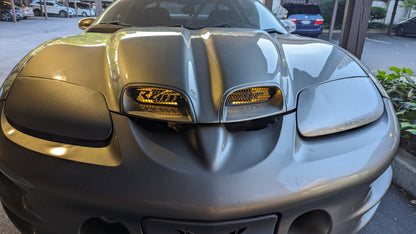 98-02 Pontiac Trans Am WS6 Ram Air hood grills with "Ram Air" text.